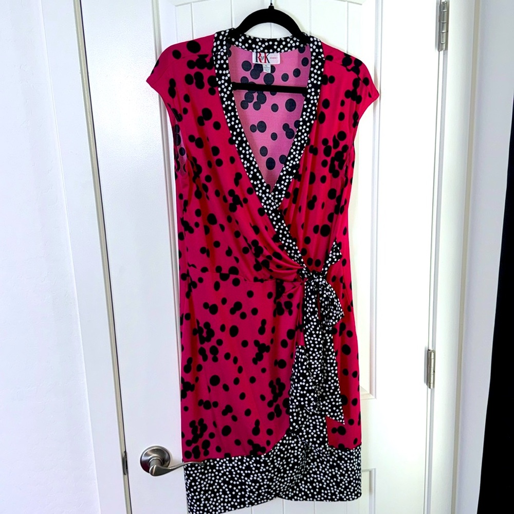 Pink, white, and black dress with faux wrap design